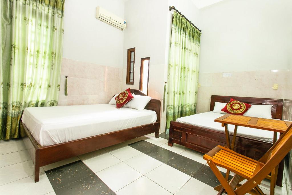 Двухместный (Номер Делюкс с кроватью размера «queen-size») отеля SPOT ON 804 My Hanh Hotel, Дананг