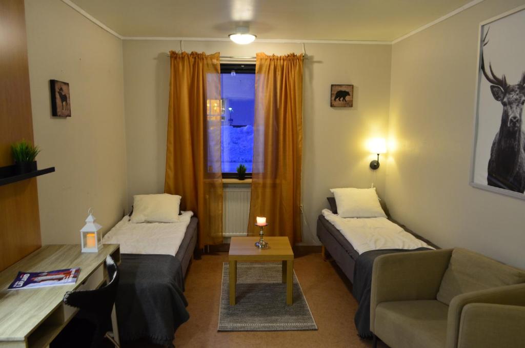 Двухместный (Двухместный номер эконом-класса с 2 отдельными кроватями и общей ванной комнатой) хостела River Motell & Vandrarhem, Хапаранда