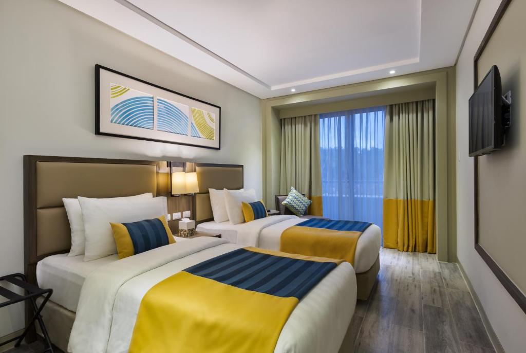 Двухместный (Улучшенный двухместный номер с 1 кроватью или 2 отдельными кроватями) отеля Belmont Hotel Boracay, Боракай