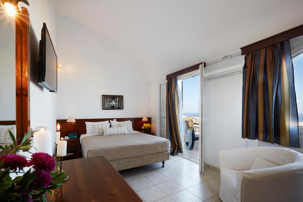 Двухместный (Стандартный двухместный номер с 1 кроватью или 2 отдельными кроватями) отеля Milos Villas Hotel, Тира