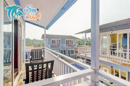 Двухместный (Двухместный номер с 1 кроватью и балконом) курортного отеля Sea Shell Beach Cottages & Suites, Арамболь