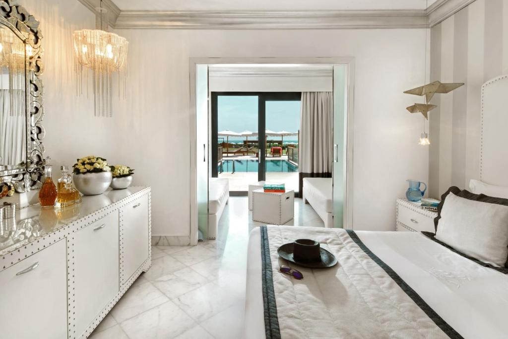 Семейный (Семейный номер, вид на море, собственный бассейн) курортного отеля Mitsis Alila Exclusive Resort and Spa, Фалираки