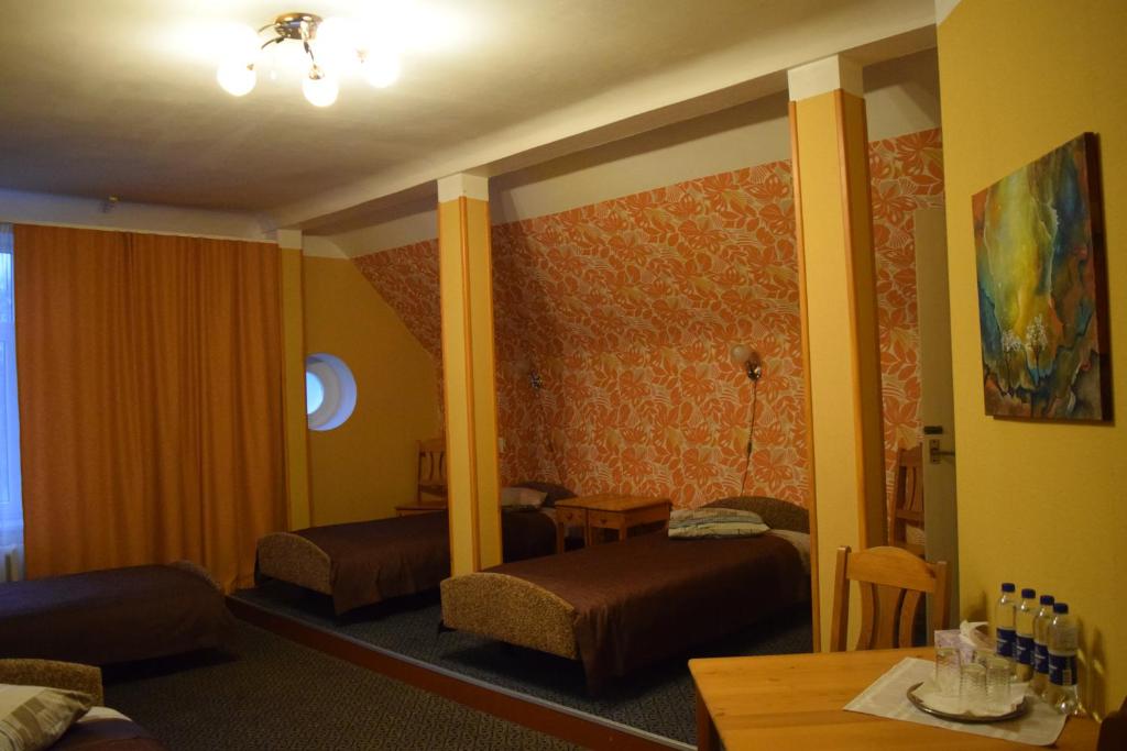Четырехместный (Четырехместный номер) отеля Kalna Ligzda, Смилтене