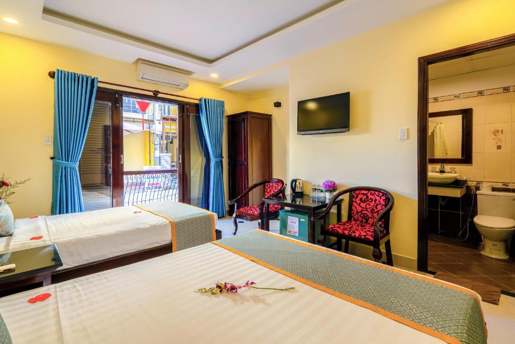 Двухместный (Двухместный номер Делюкс с 2 отдельными кроватями) отеля Golden River Hotel, Хойан