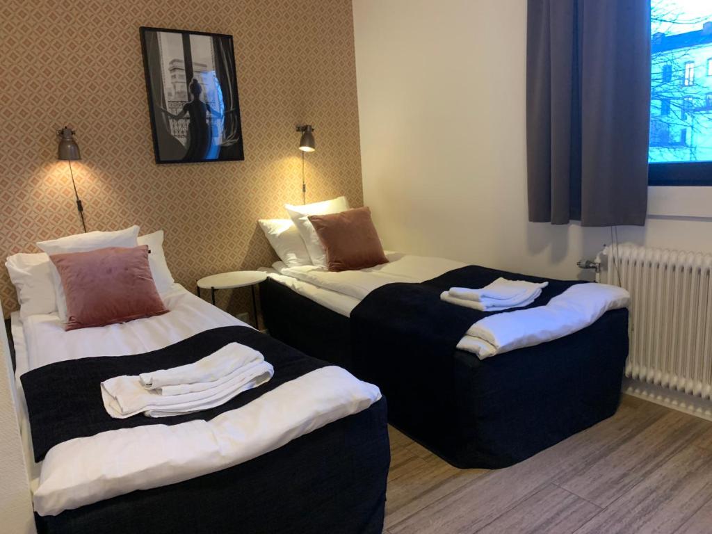 Двухместный (Стандартный двухместный номер с 2 отдельными кроватями) отеля Hotell Esplanad, Векшё