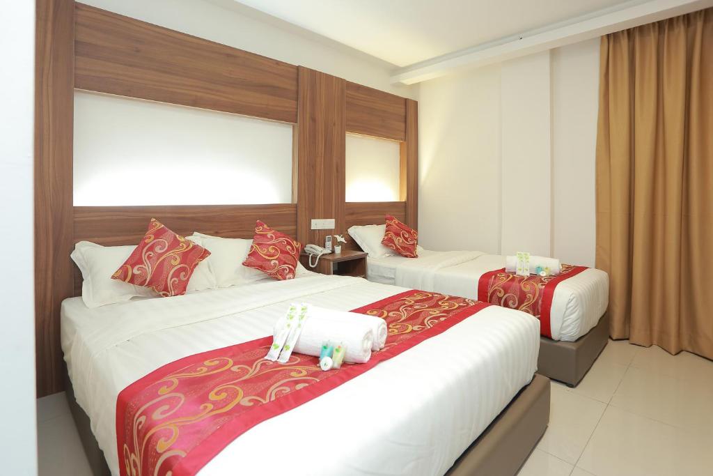 Трехместный (Трехместный номер Делюкс) отеля Bitz Bintang Hotel, Куала-Лумпур