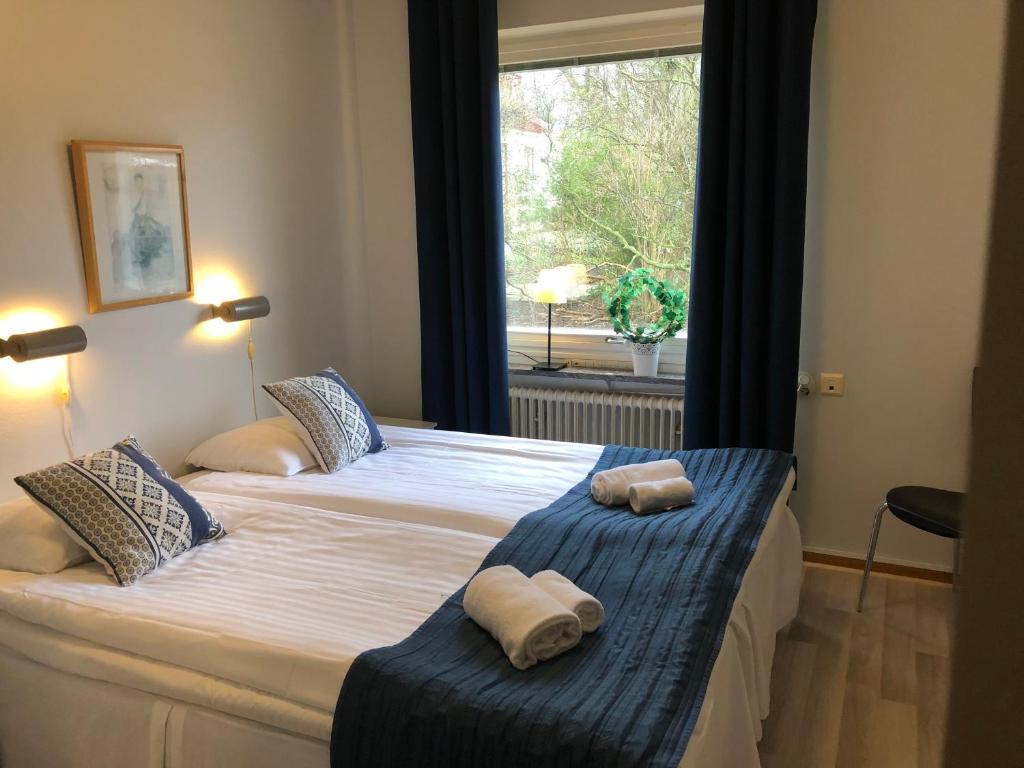 Двухместный (Двухместный номер с 2 отдельными кроватями и общей ванной комнатой) отеля Aurora Bed & Breakfast, Симрисхамн