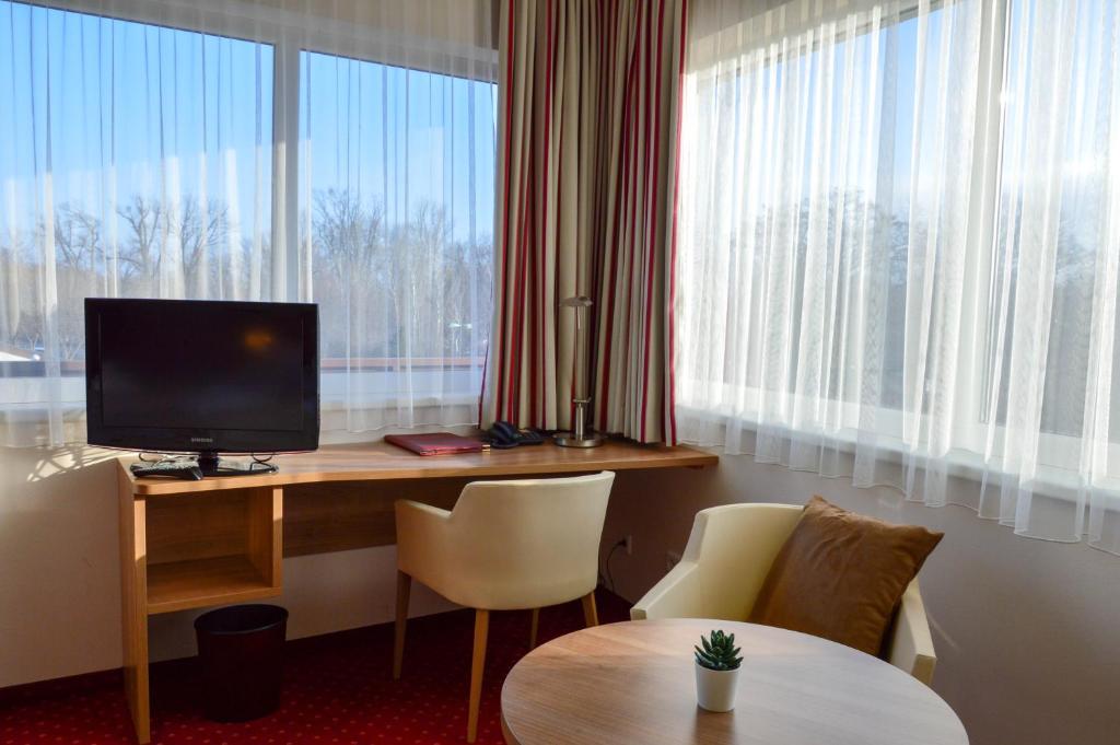 Двухместный (Двухместный номер Делюкс с 1 кроватью или 2 отдельными кроватями и балконом) отеля Das Römerhof Hotel & Restaurant, Вена