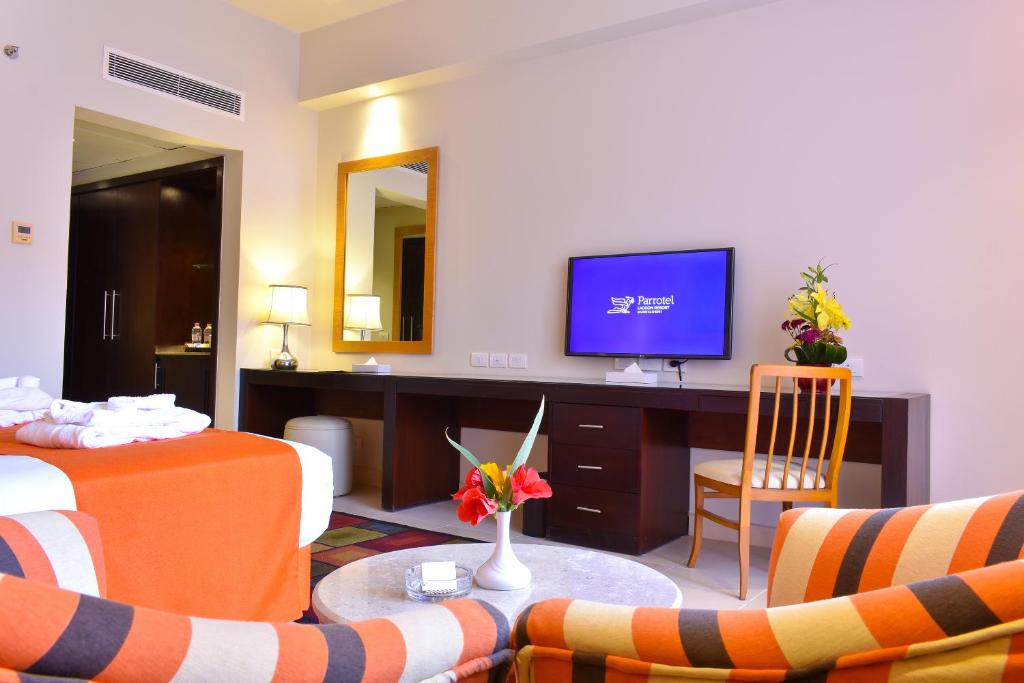 Двухместный (Двухместный номер Делюкс с 1 кроватью или 2 отдельными кроватями и видом на бассейн) курортного отеля Parrotel Lagoon Resort, Шарм-эль-Шейх