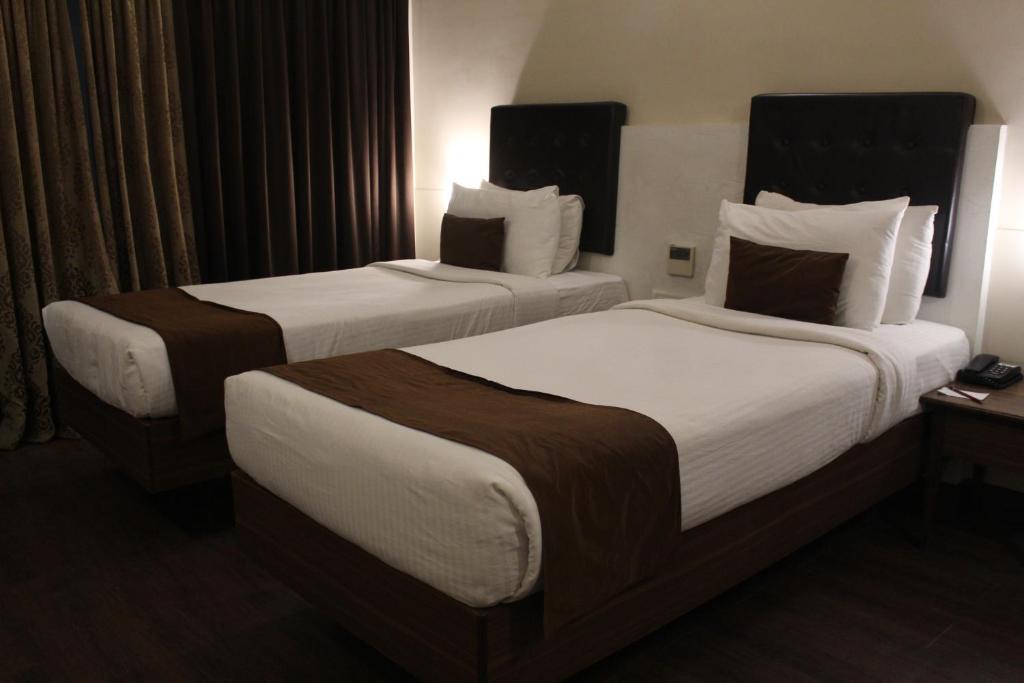 Двухместный (Двухместный номер Делюкс с 1 кроватью или 2 отдельными кроватями) отеля Vits Agra, Агра