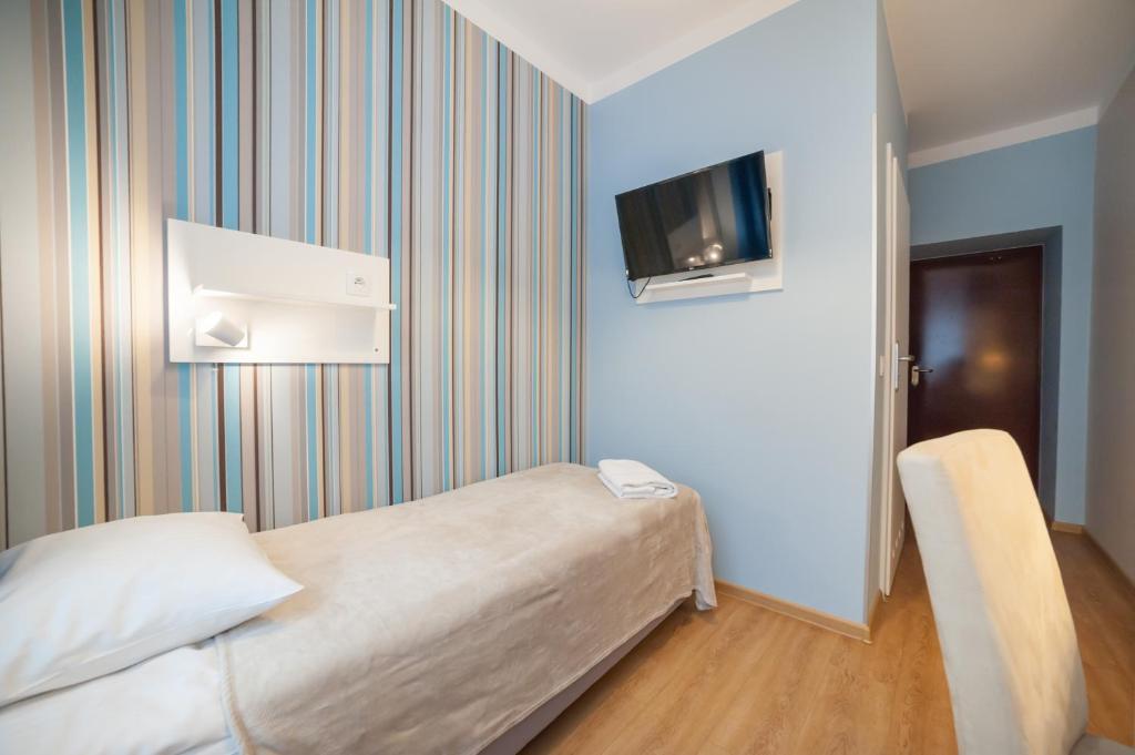 Одноместный (Одноместный номер Делюкс с собственной ванной комнатой) хостела Premium Hostel, Краков