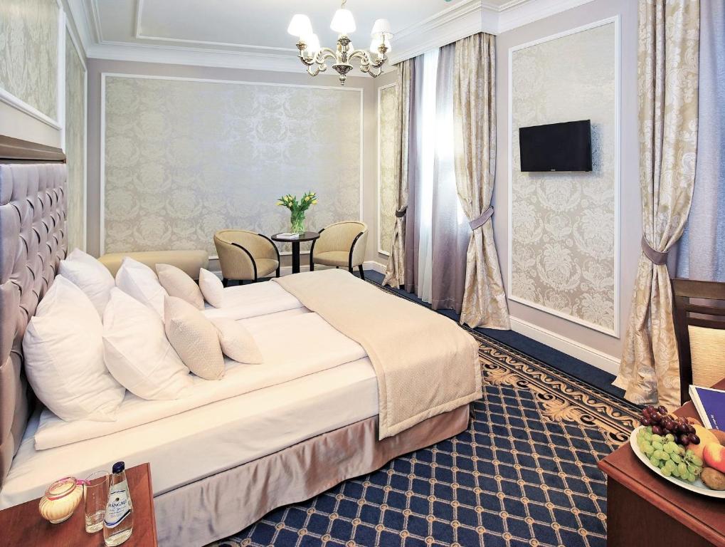 Двухместный (Улучшенный двухместный номер с 1 кроватью или 2 отдельными кроватями) отеля Rixwell Gertrude Hotel, Рига