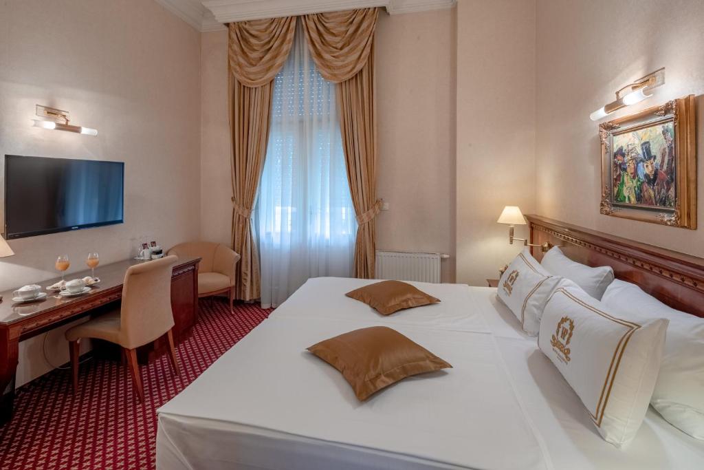 Двухместный (Стандартный двухместный номер с 1 кроватью или 2 отдельными кроватями) отеля Hotel Waldinger, Осиек