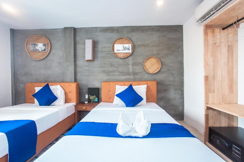 Двухместный (Улучшенный двухместный номер с 2 отдельными кроватями) отеля Grand Elevation Hotel, Пномпень