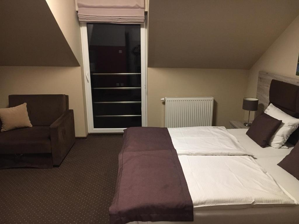 Двухместный (Стандартный двухместный номер с 1 кроватью или 2 отдельными кроватями) отеля Hotel Piast, Мальборк