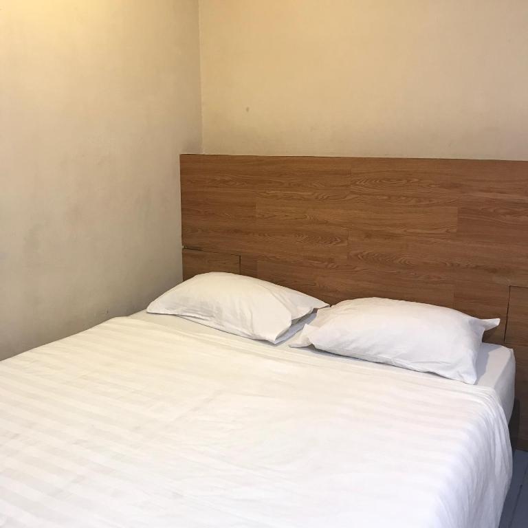 Двухместный (Стандартный двухместный номер с 1 кроватью или 2 отдельными кроватями, без окна) гостевого дома Iskandar Sinsuran Guesthouse, Кота-Кинабалу