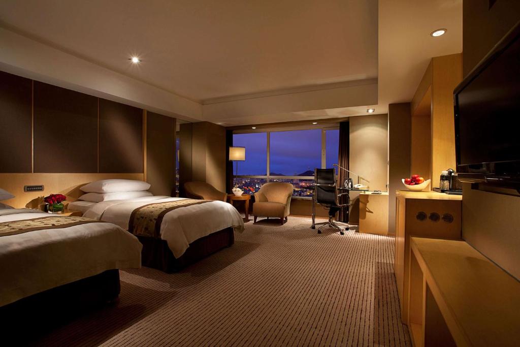 Двухместный (Двухместный номер Делюкс с 2 отдельными кроватями) отеля Kempinski Hotel Dalian, Далянь