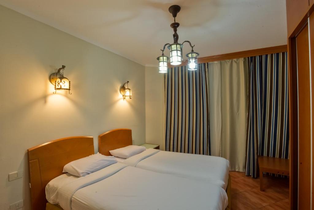 Апартаменты (Апартаменты с 2 спальнями) курортного отеля Porto Holidays Sokhna Apartments, Айн-Сохна