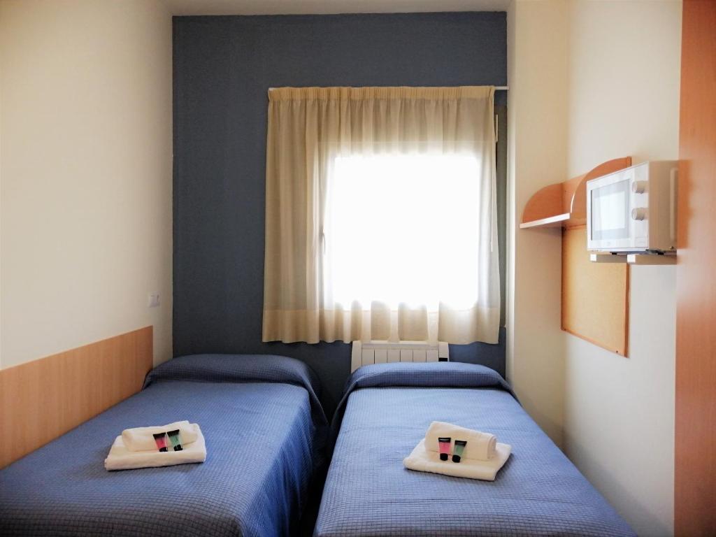 Двухместный (Двухместный номер с 2 отдельными кроватями и основными удобствами) хостела Residencia Universitaria As Burgas, Виго