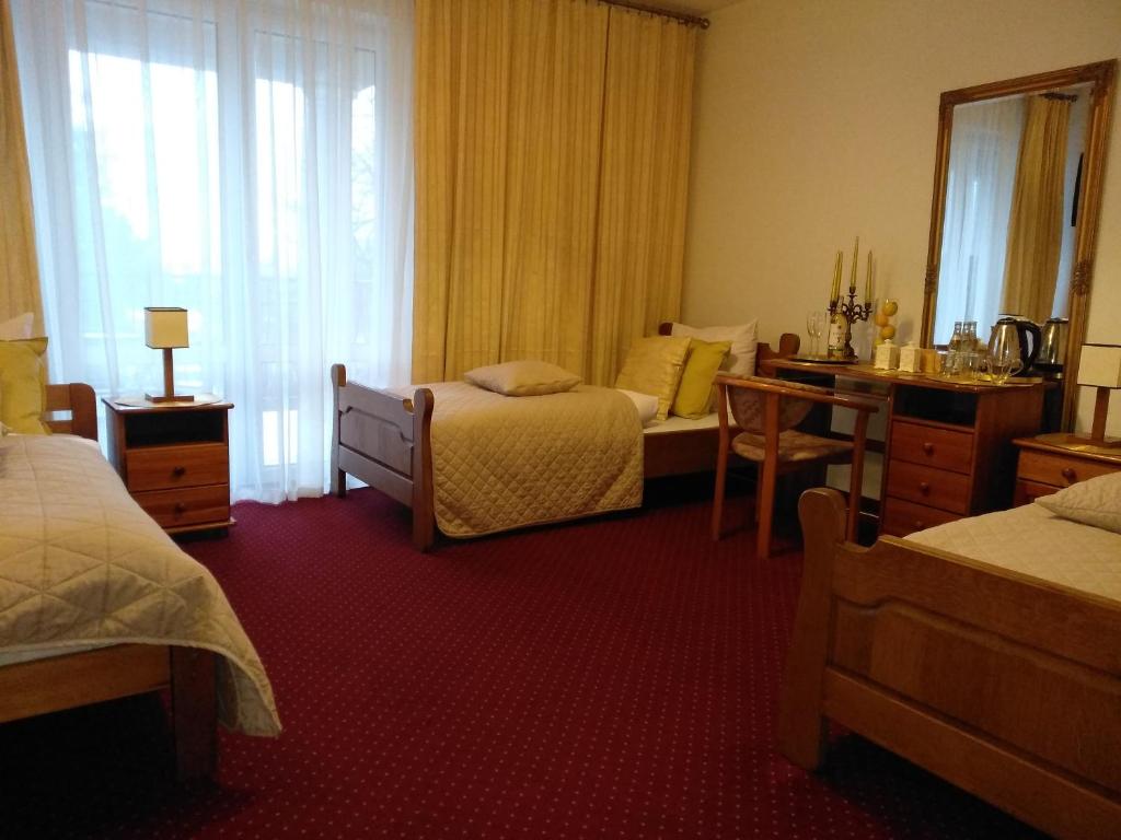Двухместный (Улучшенный двухместный номер с 1 кроватью или 2 отдельными кроватями и балконом) отеля Motel Polak, Замосць