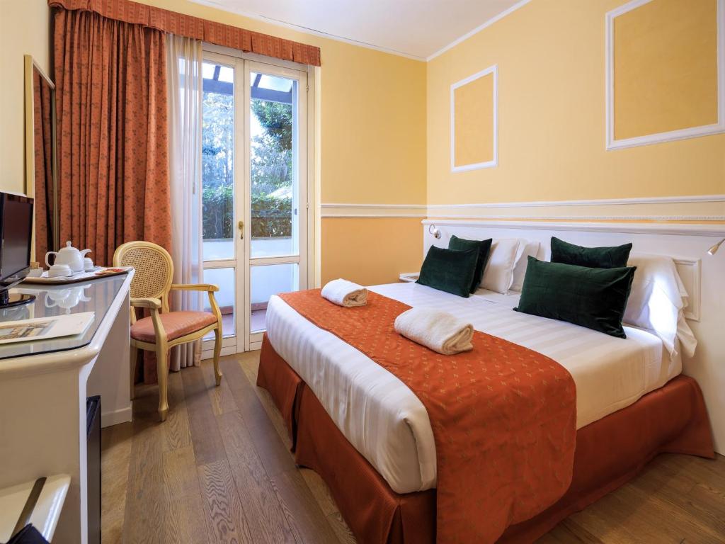 Двухместный (Стандартный двухместный номер с 1 кроватью или 2 отдельными кроватями - Дополнительное здание) отеля Hotel Villa Carlotta, Флоренция