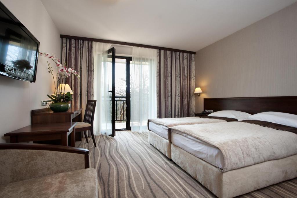 Двухместный (Двухместный номер с 2 отдельными кроватями) отеля Hotel SPA Budowlani, Щавница