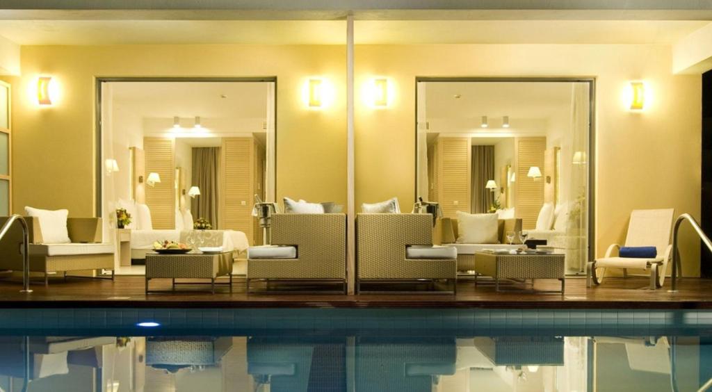 Сьюит (Номер в мезонете с видом на море и общим бассейном (для 2 взрослых и 3 детей)) курортного отеля Astir Odysseus Kos Resort and Spa, Тингаки