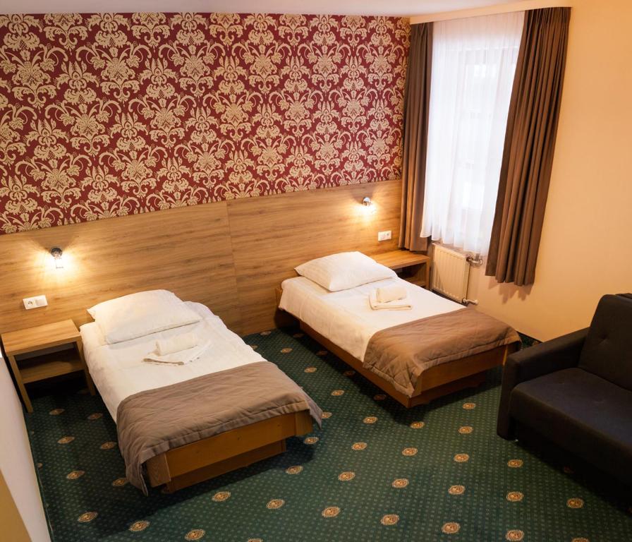 Трехместный (Трехместный номер с основными удобствами) отеля Hotel Fero Lux, Корбелюв