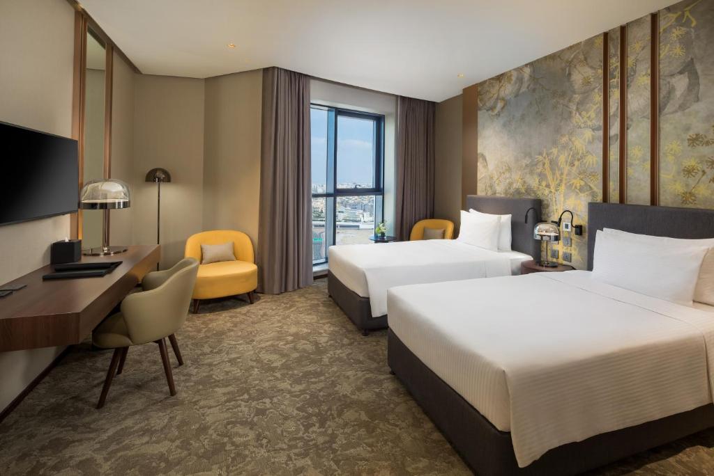 Двухместный (Улучшенный двухместный номер с 2 отдельными кроватями) отеля Millennium Place Barsha Heights Hotel, Дубай