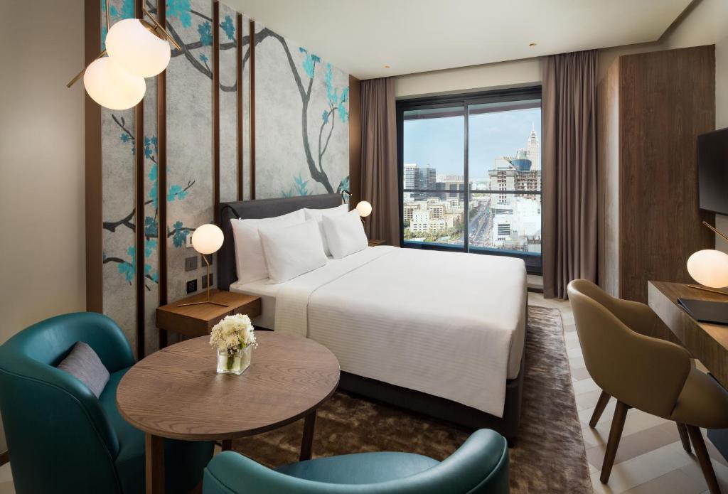 Студио (Номер-студия Делюкс с кроватью размера «king-size») апарт-отеля Millennium Place Barsha Heights Hotel Apartments, Дубай