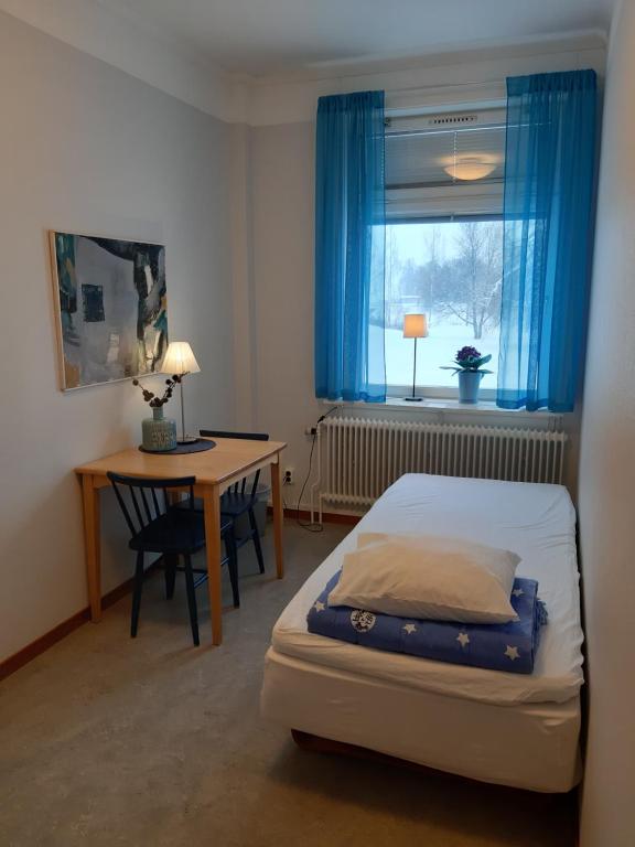 Двухместный (Двухместный номер с 2 отдельными кроватями и общей ванной комнатой) хостела Piteå Vandrarhem, Питео