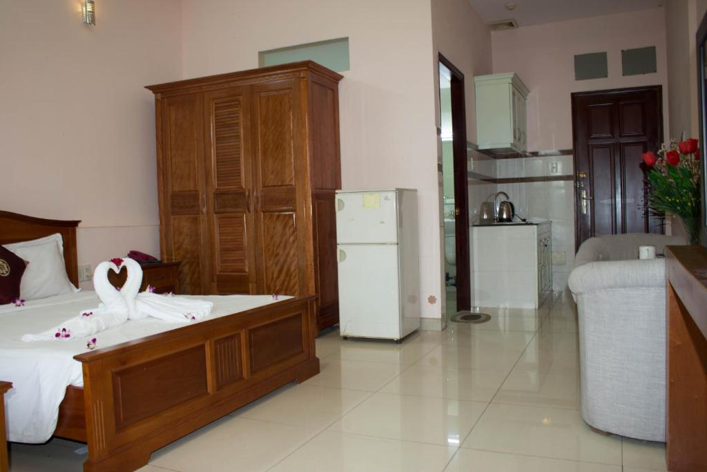 Двухместный (Улучшенный номер) апарт-отеля Hoa Phat Hotel & Apartment, Хошимин