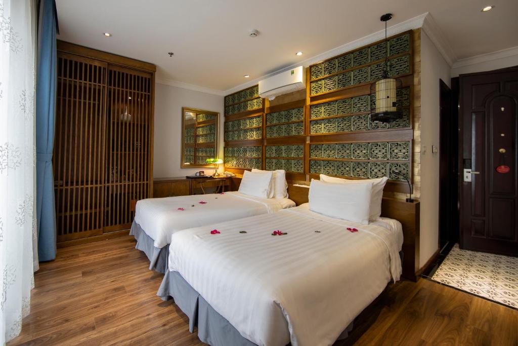 Двухместный (Двухместный номер Делюкс с 1 кроватью или 2 отдельными кроватями, вид на город) отеля Meracus Hotel, Ханой