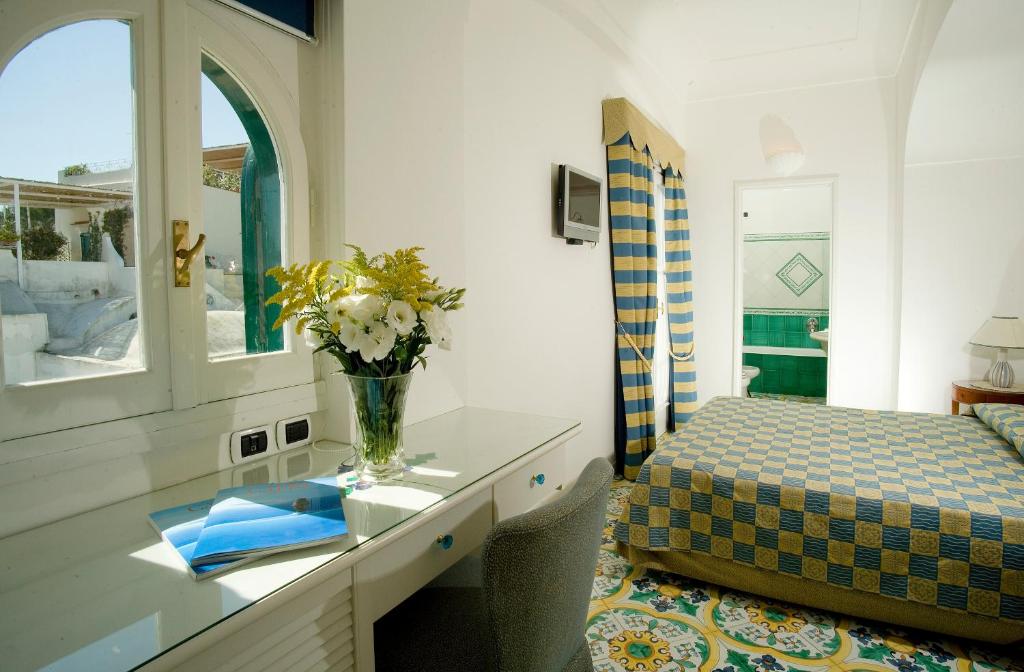 Двухместный (Стандартный двухместный номер с 1 кроватью или 2 отдельными кроватями) отеля Albergo Gatto Bianco, Капри