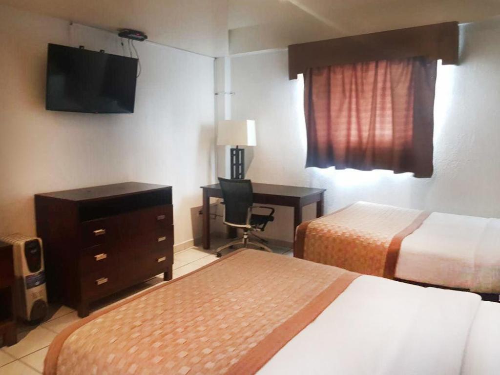 Двухместный (Двухместный номер с 2 отдельными кроватями) отеля Hotel Don Quijote, Мехикали
