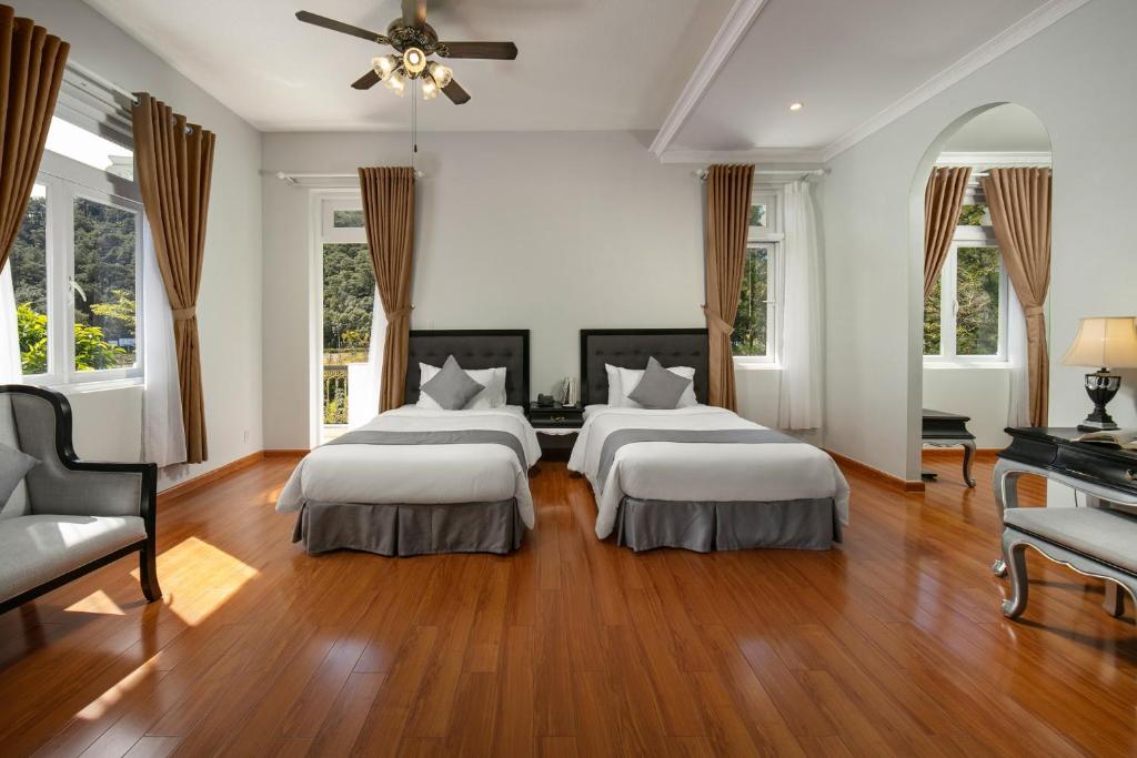 Двухместный (Двухместный номер Делюкс с 2 односпальными кроватями, вид на сад) курортного отеля SAM Tuyen Lam Resort, Далат