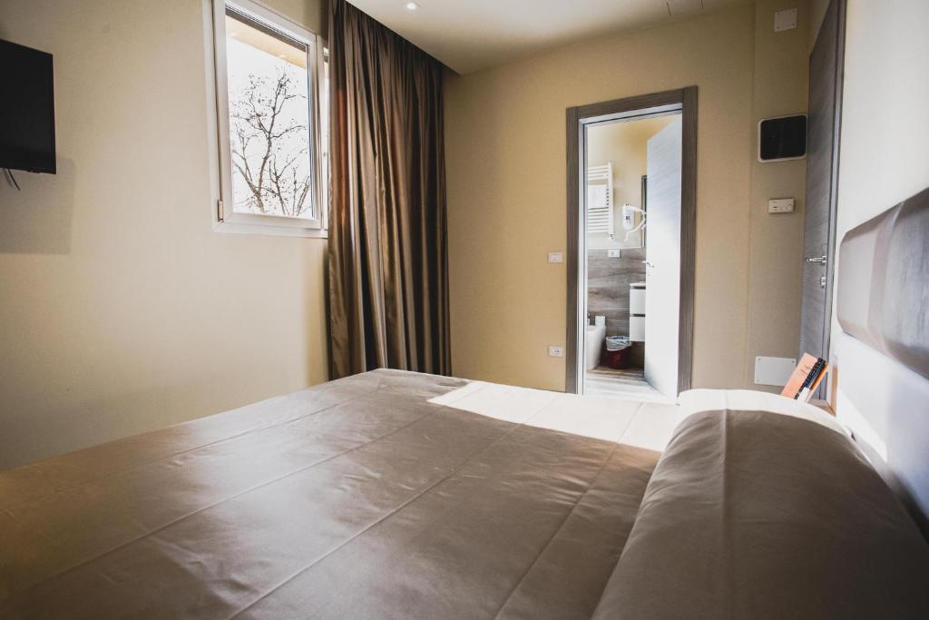 Двухместный (Двухместный номер с 1 кроватью или 2 отдельными кроватями и возможностью посещения спа-салона) отеля Hotel Fiera, Болонья