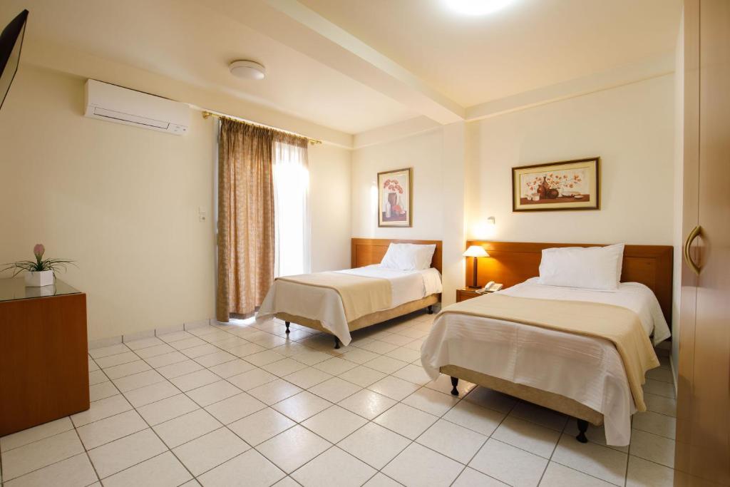 Двухместный (Двухместный номер с 1 кроватью или 2 отдельными кроватями) отеля Hotel Athina, Ламия