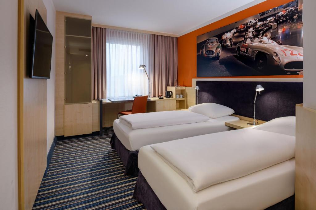 Двухместный (Стандартный двухместный номер с 2 отдельными кроватями) отеля Mercure Stuttgart City Center, Штутгарт