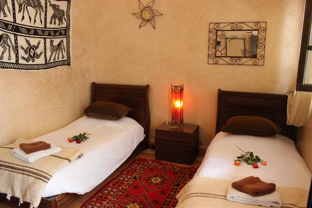 Двухместный (Двухместный номер с 2 отдельными кроватями и собственной ванной комнатой за пределами номера) отеля Riad Salmiya Dune, Эс-Сувейра