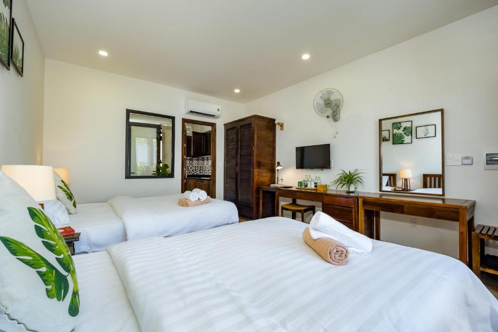 Двухместный (Двухместный номер с 2 отдельными кроватями, вид на сад) отеля Melica Resort, Дуонг-Донг