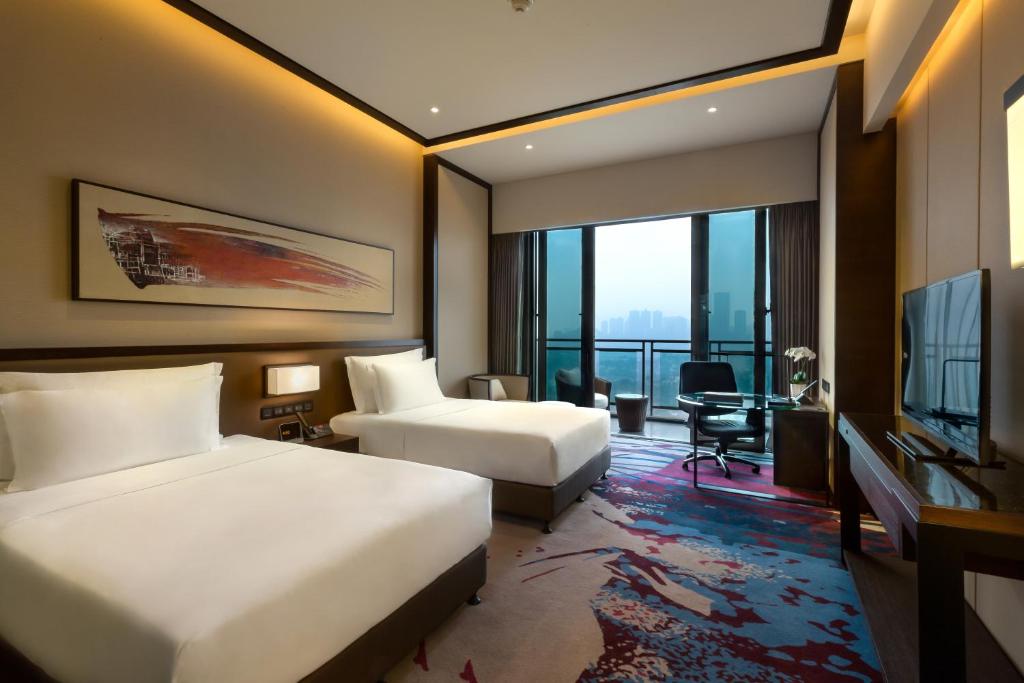 Двухместный (Двухместный номер Делюкс с 2 отдельными кроватями) отеля Crowne Plaza Chongqing New North Zone, Чунцин