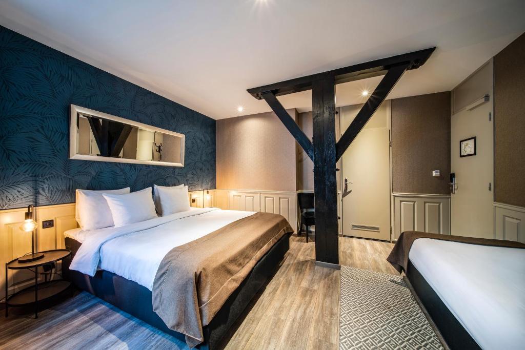 Трехместный (Трехместный номер (для 3 гостей, двуспальная кровать и односпальная кровать)) отеля Hotel Sint Nicolaas, Амстердам