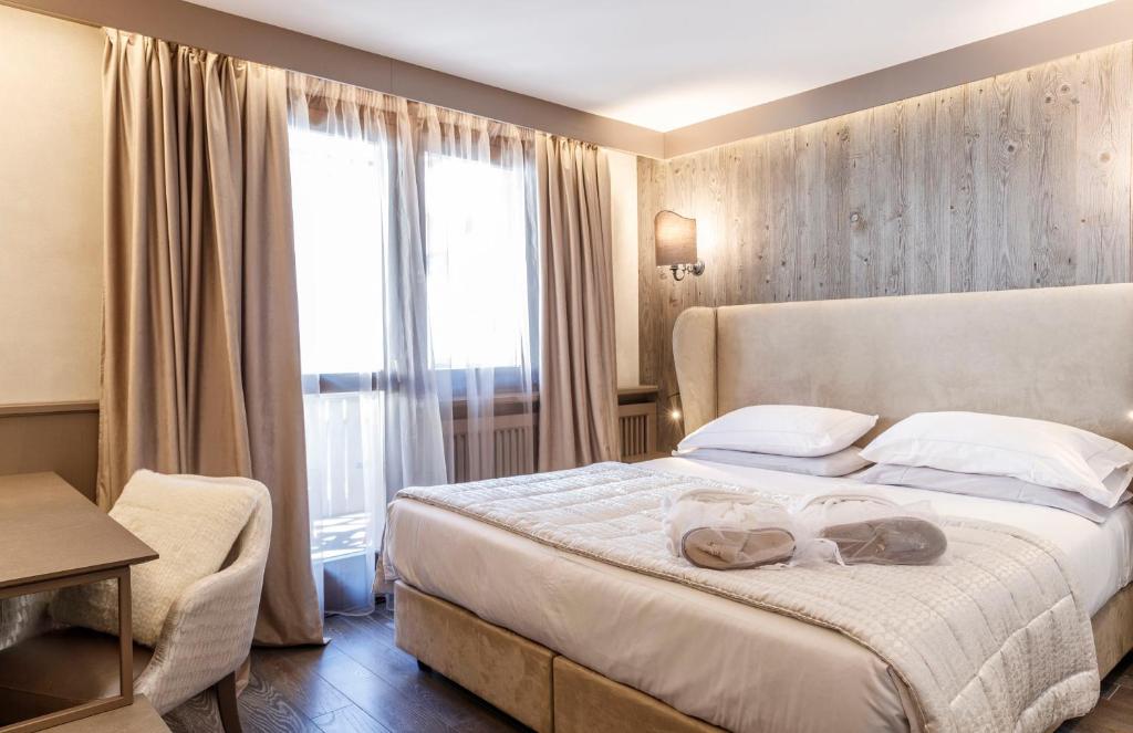 Двухместный (Двухместный номер Делюкс с 1 кроватью) отеля Hotel Spinale, Мадонна-ди-Кампильо