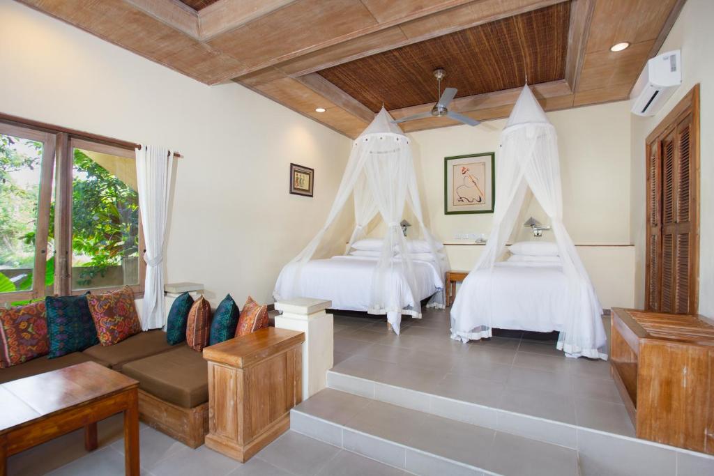Двухместный (Двухместный номер с 1 кроватью или 2 отдельными кроватями и балконом) отеля Tegal Sari Accommodation, Убуд