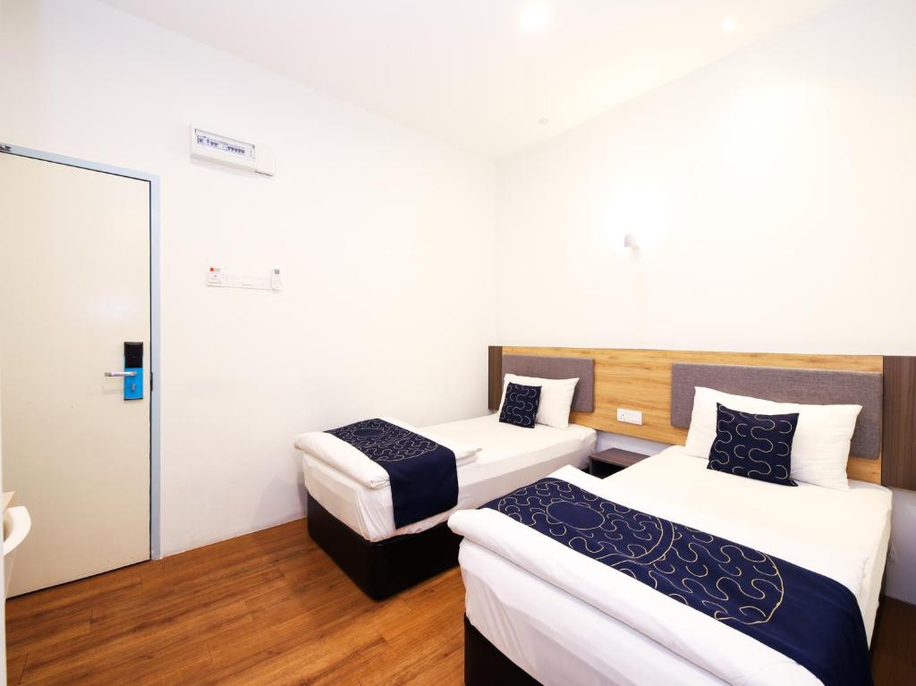 Двухместный (Стандартный двухместный номер с 2 отдельными кроватями) отеля OYO Capital O 1225 Agape Hotel Selayang, Куала-Лумпур