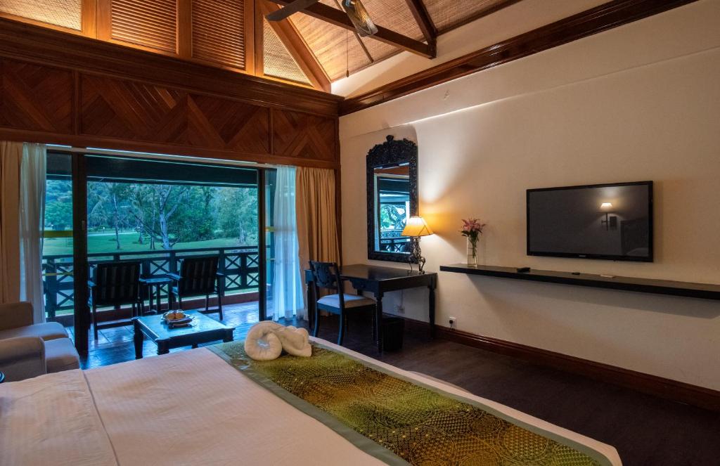 Двухместный (Двухместный номер «Борнео» Делюкс с 1 кроватью или 2 отдельными кроватями, вид на сад) курортного отеля Nexus Resort & Spa Karambunai, Кота-Кинабалу
