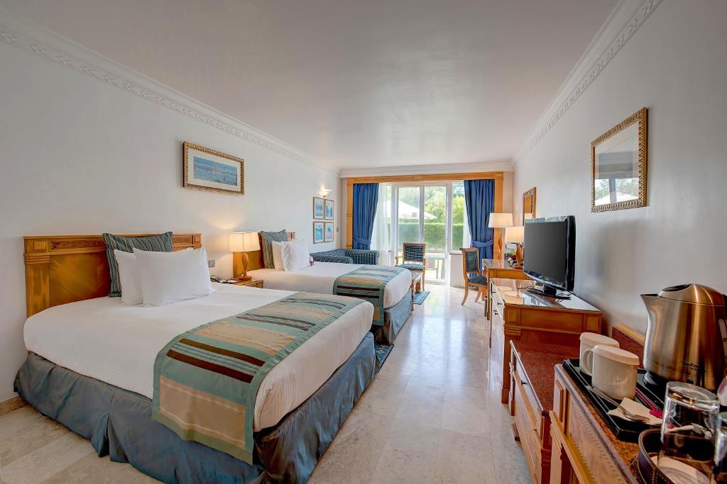 Двухместный (Стандартный двухместный номер с 2 отдельными кроватями) курортного отеля Crowne Plaza Resort Salalah, Салала