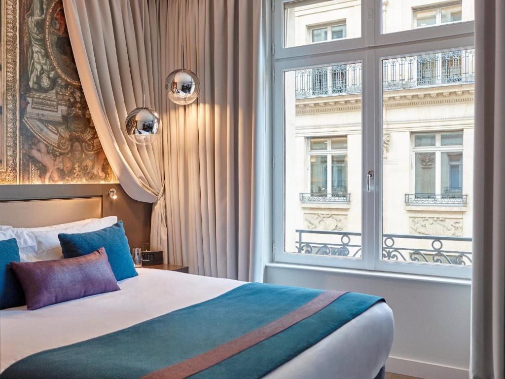 Двухместный (Улучшенный двухместный номер с 1 кроватью) отеля Hotel Indigo Paris - Opera, Париж