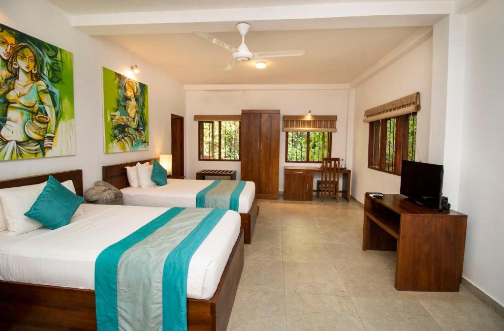 Двухместный (Номер Делюкс с видом на бассейн) отеля Amaara Forest Hotel Sigiriya, Сигирия